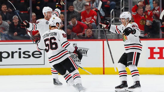 Kane scores 2 more, Blackhawks beat Red Wings 5-4 in OT