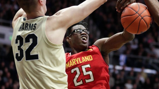 Edwards’ late flurry leads Purdue past No. 23 Maryland 62-60
