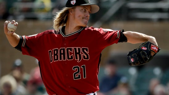 Newcomer Kelly gets 1st chance to catch Arizona ace Greinke