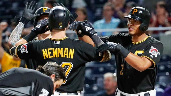 Newman homers twice as Pirates rally past Reds 6-5
