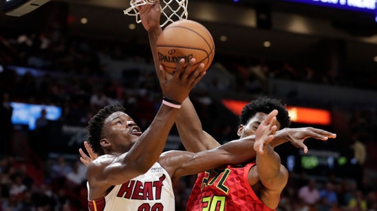 Jimmy Butler's week: A baby, a Heat debut and a first win