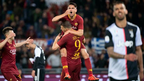 Roma beats champion Juventus 2-0 in bid for top 4 spot