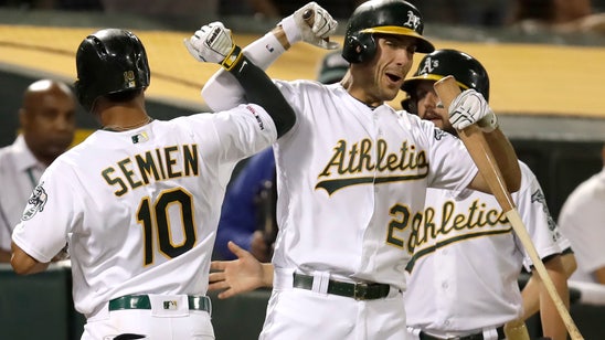 Semien reaches base 6 times, A's roll past Rangers 12-3