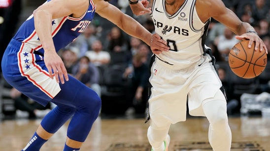 Gay scores 21 as the Spurs defeat 76ers 123-96