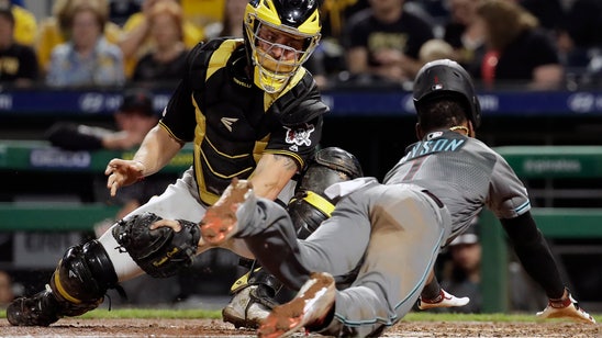 Dyson’s dive gets run on review, D-backs beat Pirates 2-1
