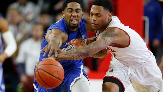 No. 21 Buffalo beat Miami (OH) 77-69 for share of MAC title