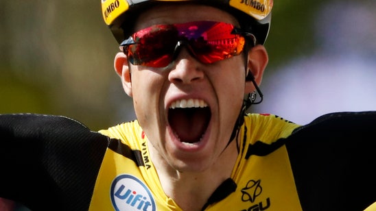 Stage 10 winner Van Aert hits barrier, crashes out of Tour