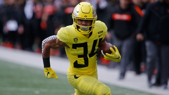 Verdell has 5 TDs in Oregon’s 55-15 win over Oregon State