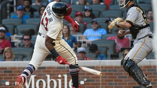 Acuna uses power, speed to help Braves pad division lead