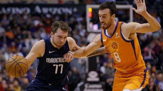 Doncic pours in 42 points, Mavericks top Suns 120-113