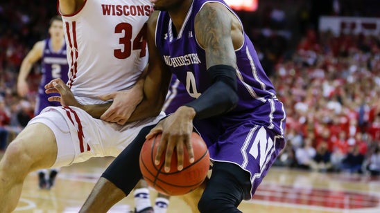 Happ’s triple-double leads Wisconsin past Northwestern