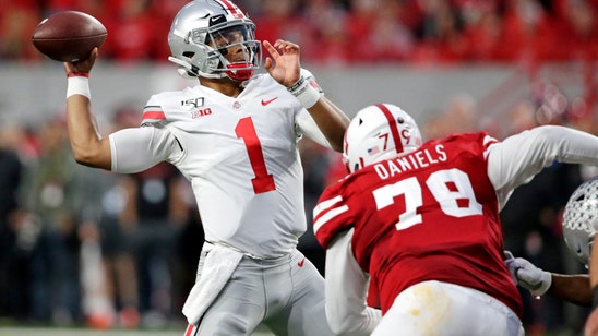 No. 5 Ohio St. throttles Huskers 48-7 behind Fields, defense