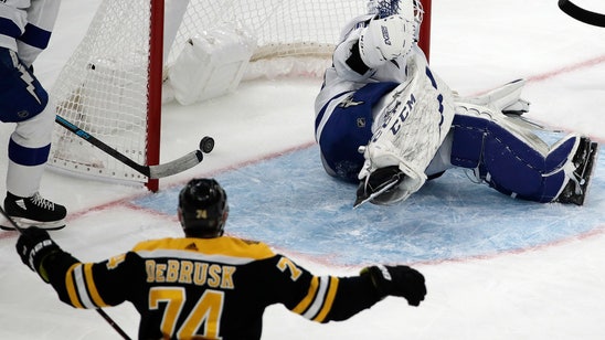 Bruins use late scoring barrage snap Lightning’s streak 4-1