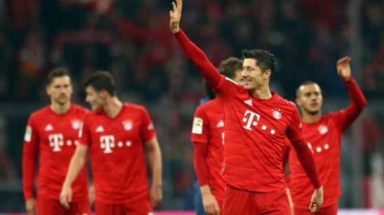 Lewandowski grabs 2 as Bayern crushes Dortmund 4-0