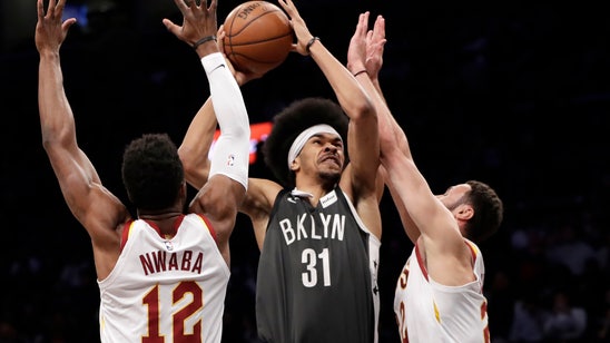 Dinwiddie leads Nets in 4th as they beat Cavs 113-107