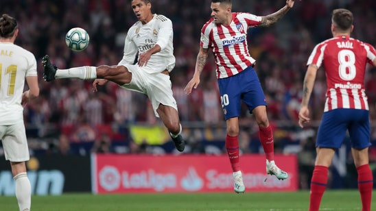 Real Madrid stays top after 0-0 derby draw with Atlético