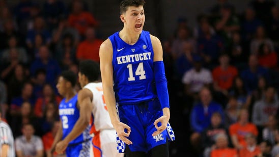 No. 7 Kentucky tightens D, rallies to beat Florida 65-54