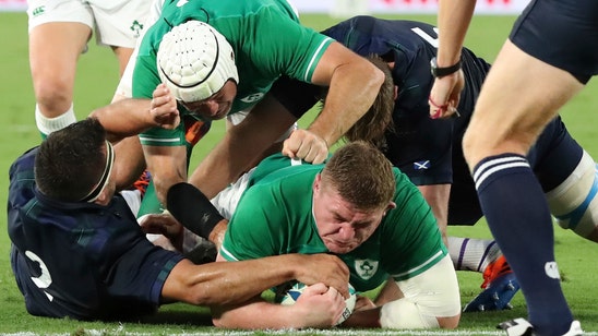 The Latest: Japan rises up rankings after upsetting Ireland