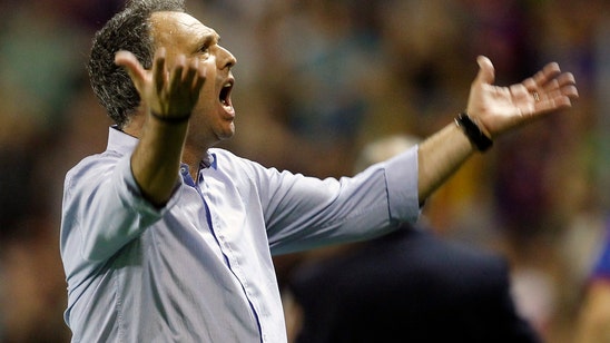 Coach fighting leukemia puts Sevilla back on track in Spain
