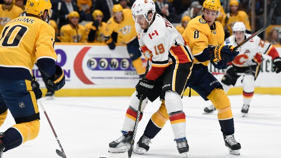 Tkachuk's trickery sends Flames past Predators 6-5 in OT