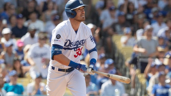 Ryu hits, pitches Dodgers to 100th win, 7-4 over Rockies
