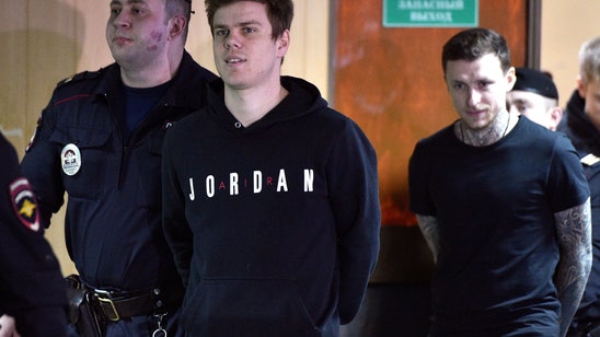 2 Russian soccer players let out on parole in brawl case