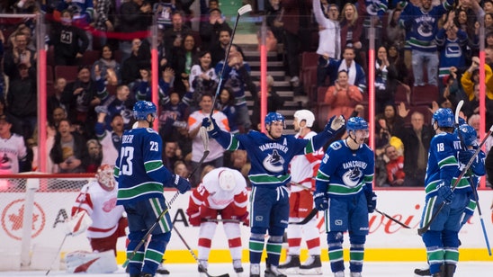 Pettersson scores in return from injury; Canucks beat Wings