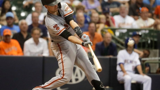 Posey hits grand slam in 10th, Giants beat Brewers 10-7