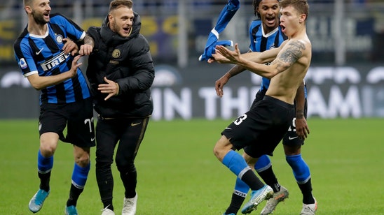 Inter fights back to beat Verona 2-1 and move top of Serie A