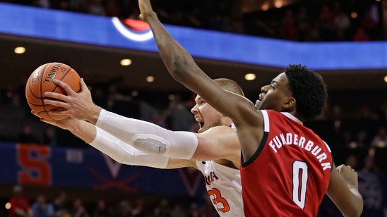 Guy, Salt help No. 2 Virginia beat NC State 76-56 in ACCs