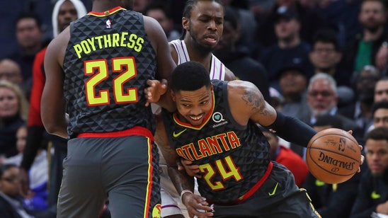 Bazemore scores 23 as Hawks beat Wolves 123-120 in OT
