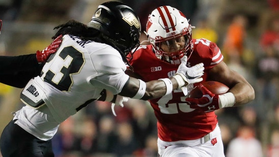 Taylor runs for 222 in No. 14 Badgers’ 45-24 win over Purdue