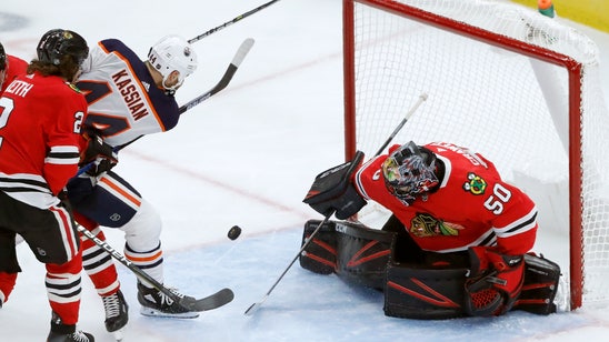 Crawford lead Blackhawks to 1st win, 3-1 over Oilers