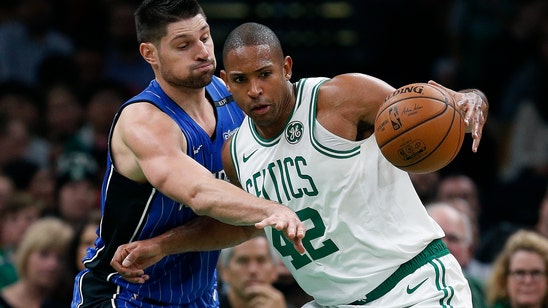 Vucevic scores 24 with 12 rebounds as Magic hold off Celtics