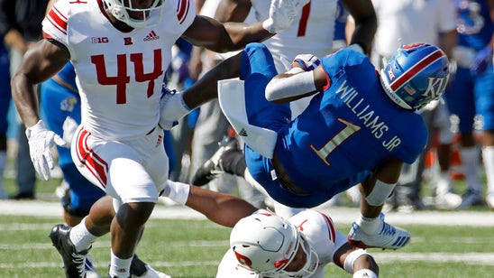 Takeaways, run game lead Kansas to 55-14 blowout of Rutgers