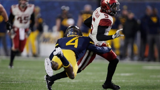 New coach Neal Brown's task is to keep West Virginia rolling