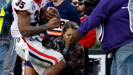 Photographer hit in Georgia-Auburn game out of hospital