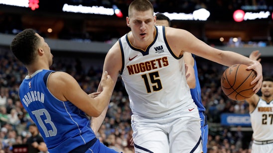Jokic helps Nuggets beat Mavs as Doncic sits with sore ankle