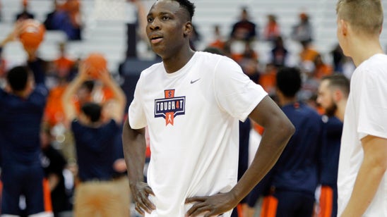 No. 11 Virginia uses stellar defense to beat Syracuse 48-34