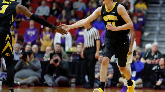 No. 22 Iowa cruises past Northern Iowa 77-54