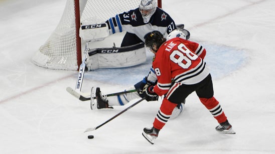 Kane gets 1,000th point, Blackhawks beat Jets 5-2