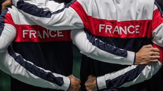 Players give mixed reviews halfway through new Davis Cup