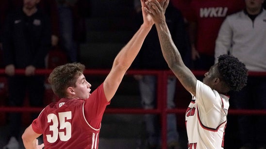 Banton helps Western Kentucky beat No. 15 Wisconsin 83-76