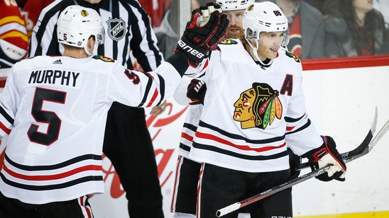 Kane scores twice, leads Blackhawks to 5-3 win over Flames