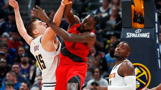 McCollum leads Blazers past cold Nuggets, 97-90