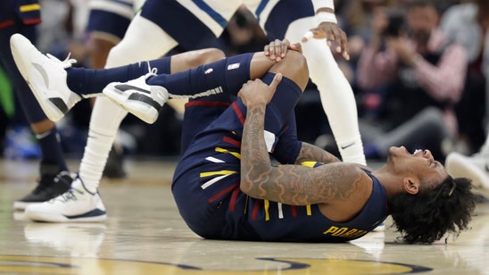 Cavs rookie Porter to miss at least 2 weeks with knee sprain