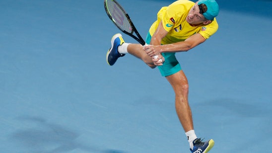 Alex de Minaur out of Australian Open with abdominal strain