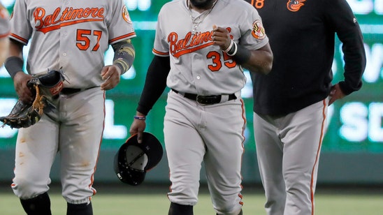 Davis' error helps Rangers to 4-3 win over banged-up Orioles