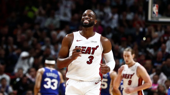 Wade scores 30 in last game in Miami; Heat top 76ers 122-99