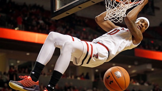 No. 11 Texas Tech shares Big 12 lead after 84-80 OT win